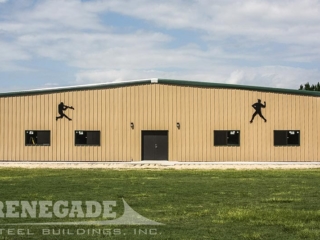 steel metal building with, double doors and windows, baseball training facility