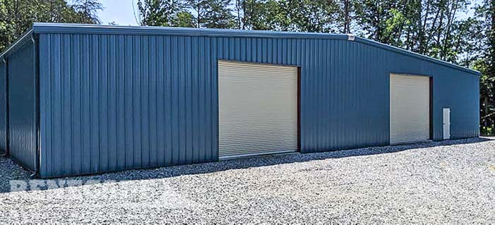 100x100 steel building with blue walls and white doors