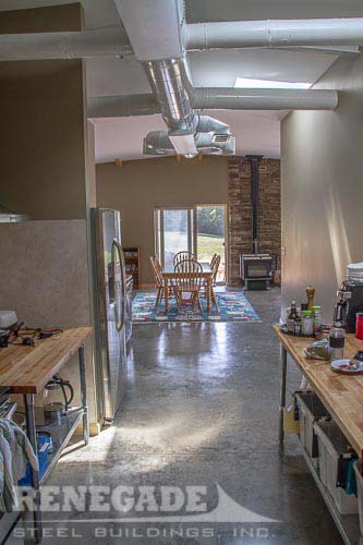 steel building home kitchen and dining area