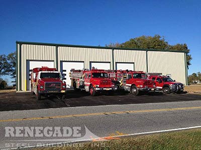 Steel building volunteer fire station with trucks in front