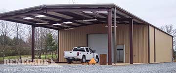 steel building with two open bays for covered work area