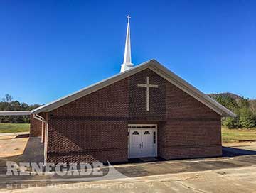 steel building church with brick walls
