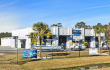 Steel Building Boat dealership with service area and sales floor