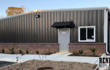 40x60x12 steel building with Burnished Slate walls and white trim