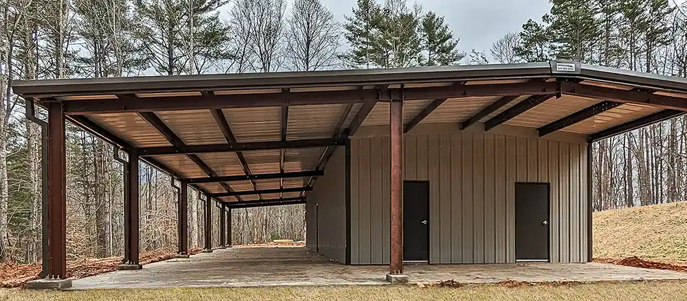 Tan steel building with open bays and lean to - 22x88x11.5 building with 18x88x10 lean to.