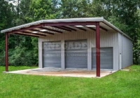 42x75x17 renegade steel building with gray walls and trim, 3 large roll up doors and an open bay