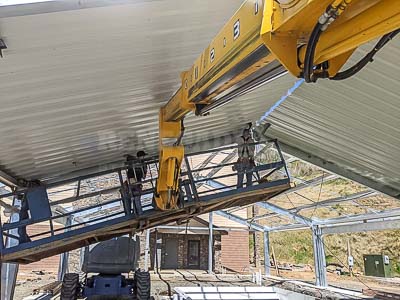 Steel Building Pool Cover construction interior liner panel installation crane