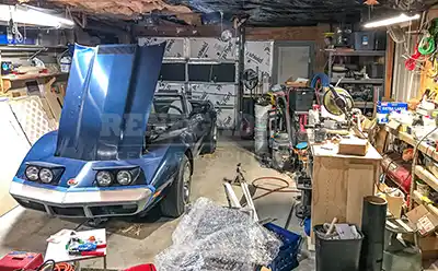 Messy cluttered up garage needs a Renegade steel building