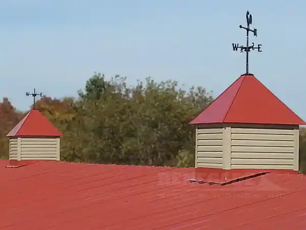 Renegade steel building cupola with red roof and tan panels