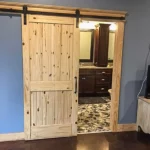 renegade seel building barndominium interior bathroom sliding door