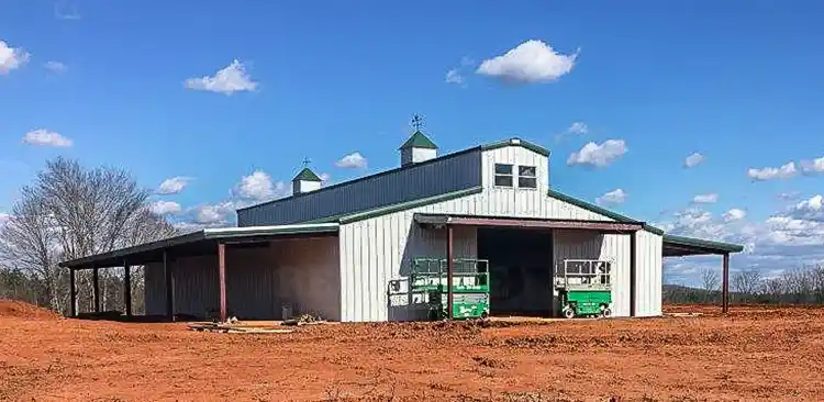 Renegade steel farm building with monitor style roof and lean to's