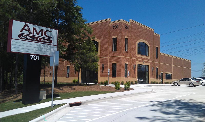 Custom pre engineered steel building with 2 stories, brick exterior, office and warehouse